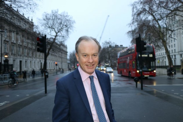 Alex Aiken standing in Parliament Street smiling.