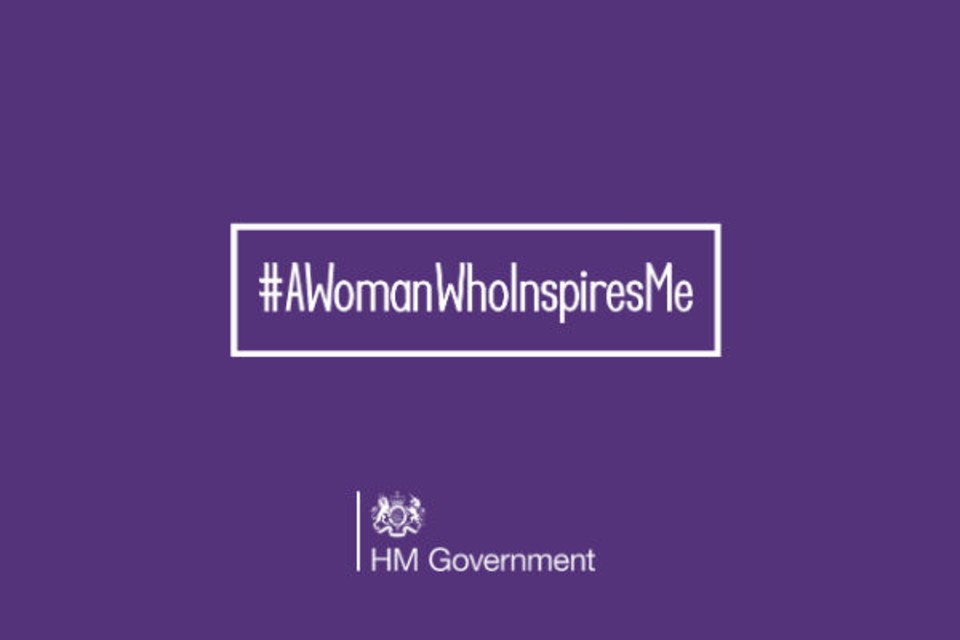 Purple background and hashtag reading a woman who inspires me for internal women's day campaign.