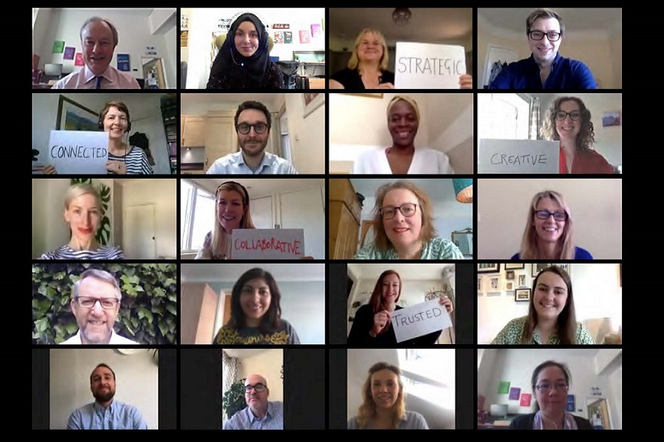 Zoom screenshot showing 20 portraits men and women.