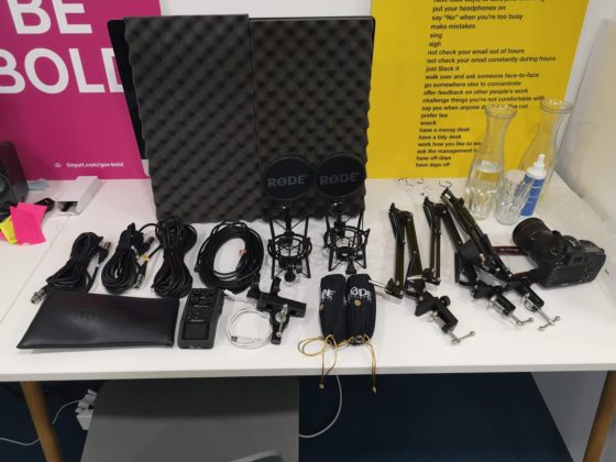 microphones, cables, sound recorders and microphone stands used to record podcasts.
