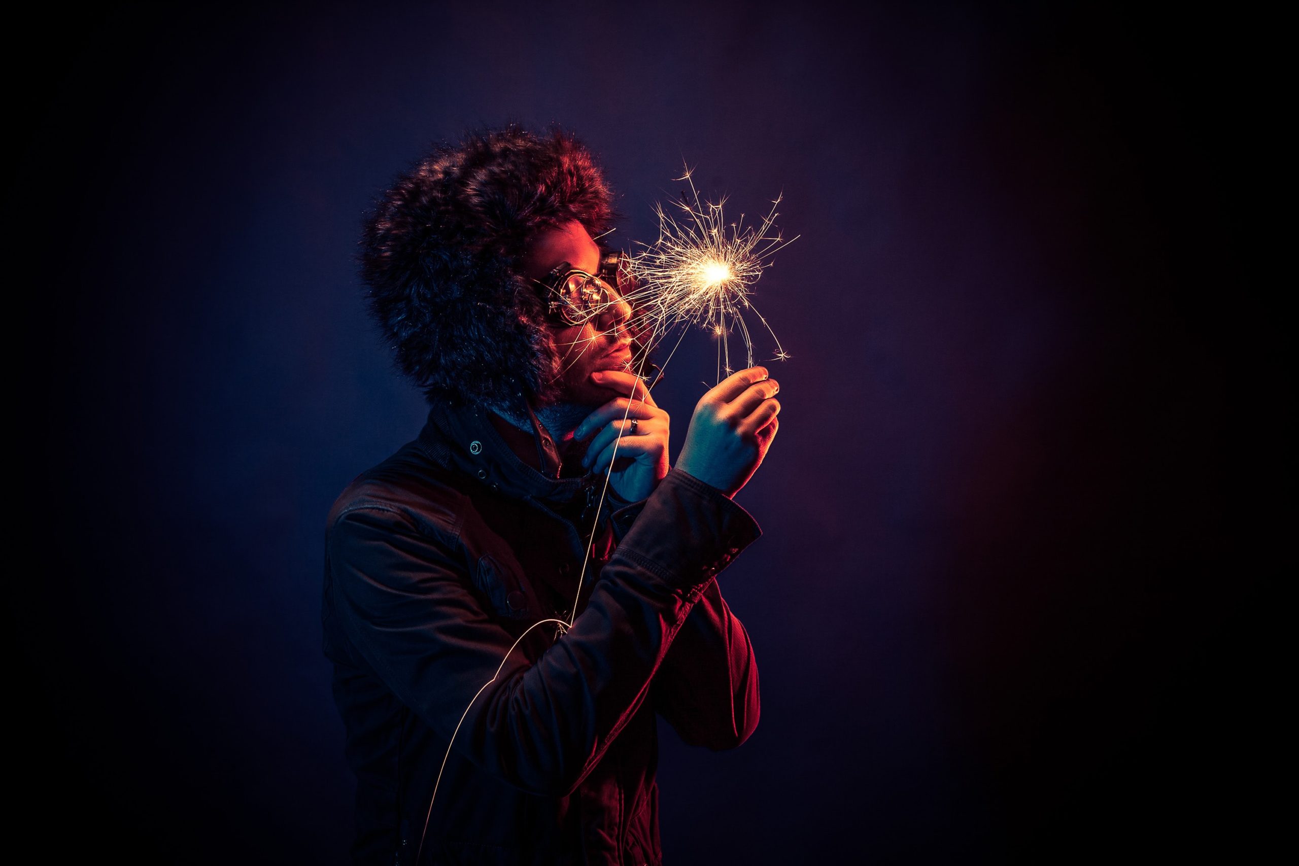 man holding sparkler