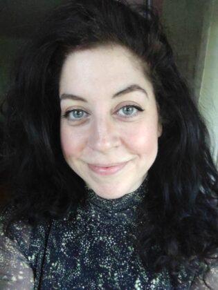 A portrait image of Justine Wrightson