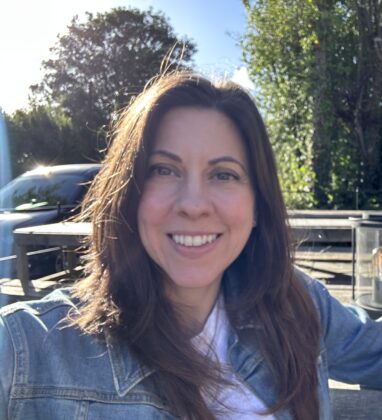 A portrait image of Sara Vogt, Deputy Director for Corporate Communications at the Ministry of Justice and GCS Deputy Head of Profession for Internal Communications, smiling at the camera