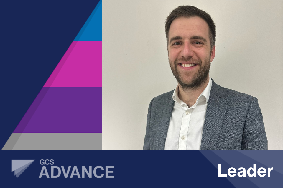 Selfie-style picture of Phil Scullion, from Selfie-style picture of Lizzie Harris, from Department for Transport and Advance Expert graduate, with the 'Advance' logo and the word 'Advance' on a blue coloured banner layered over the top and the 'Advance' five tiered coloured pyramid behind on a dark navy background, with the 'Advance' logo and the word 'Expert' on a blue coloured banner layered over the top and the 'Advance' five tiered coloured pyramid behind on a dark navy background