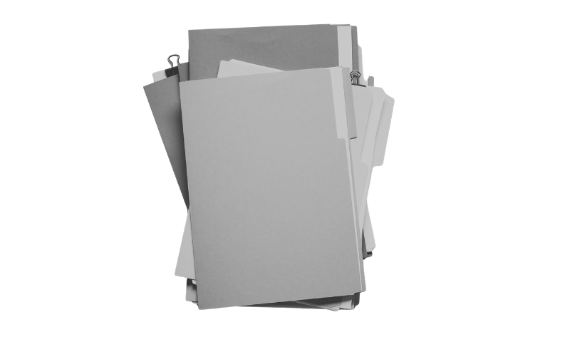 A stack of papers in folders.