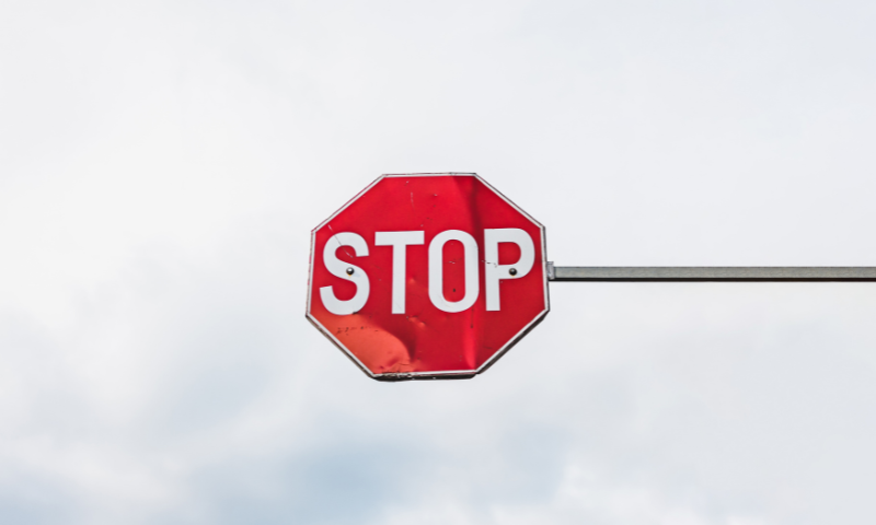 A red and white 'Stop' sign.